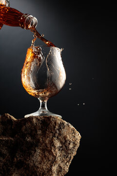Cognac resting on a piece of natural granite rock.