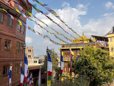Jagat Prakash Gumba Buddhist monastery with colorful prayer flags in Kathmandu, Nepal