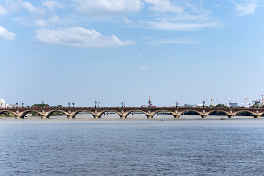 Historic Pont de Pierre bridge over the Garonne River undergoing renovation works, Bordeaux, France