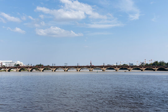 Historic Pont de Pierre bridge over the Garonne River undergoing renovation works, Bordeaux, France