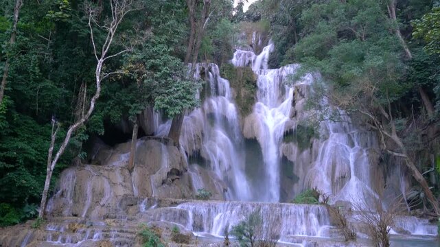 Cascading Waterfall in Lush Tropical Forest at Kuang Si Falls, Luang Prabang, Laos