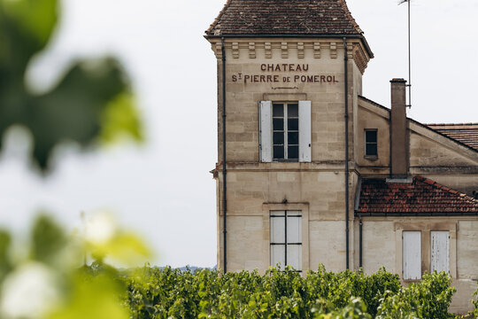 Pomerol, France - July 13, 2026: Chateau Saint Pierre de Pomerol winery building stands beside vineyards in the Bordeaux wine region.