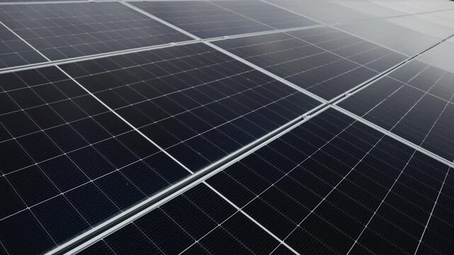 Diagonal perspective of solar panels emphasizes the scale and technology of a rooftop solar array.