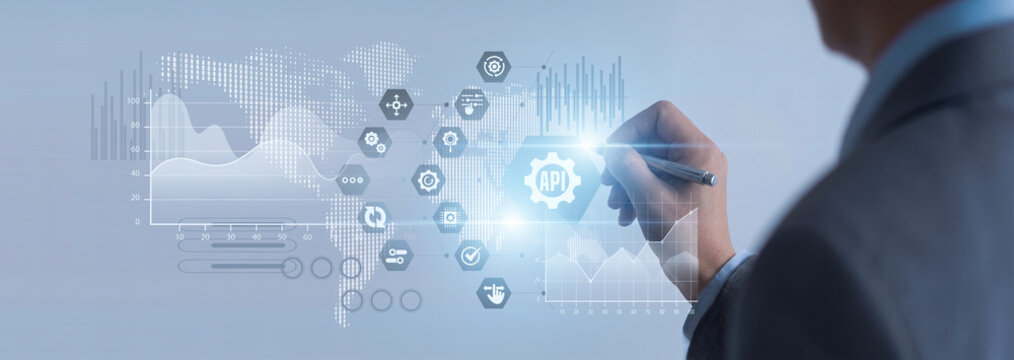 Software developer point of API (Integration) building network connectivity links. Programmer seamlessly combining software applications on a virtual screen to optimize system operations.