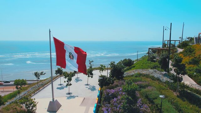 Peruvian Flag Waving Over Coastal Park in Lima Peru