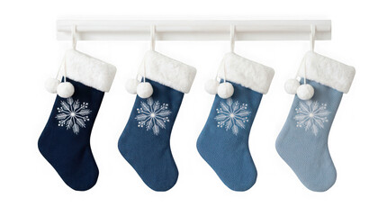 Naklejka premium Four blue christmas stockings hanging isolated on transparent background