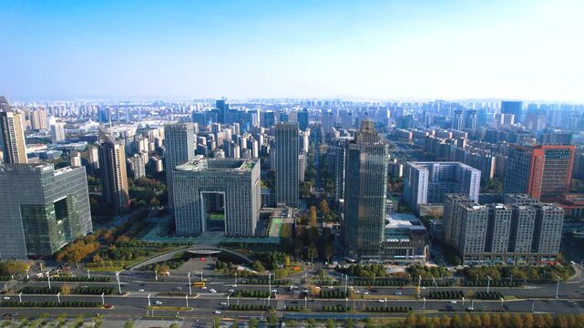 Aerial View of Modern City Skyline with Skyscrapers and Green Boulevards