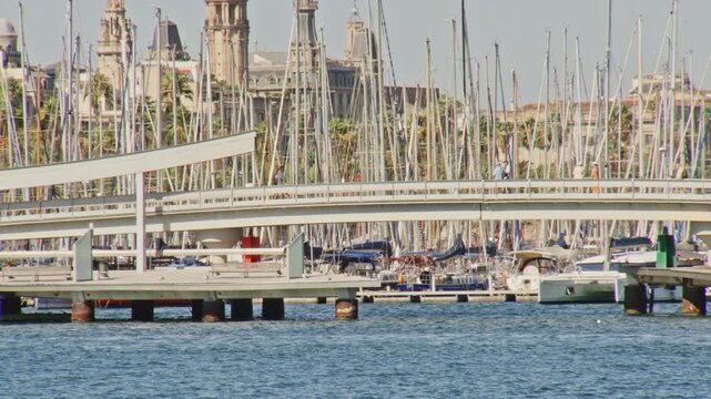 crash zoom effect zooming into boats at port vell barcelona