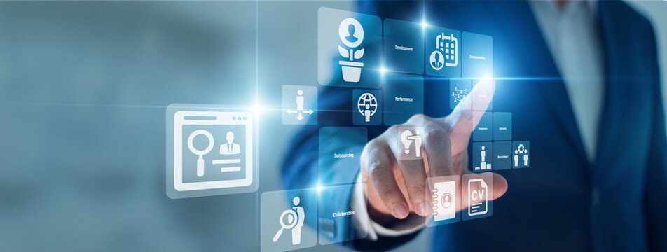 Recruiter hand touch virtual screen updating Human Resources talent database. Screening candidate profiles and managing employee onboarding to build stronger teams for the company.