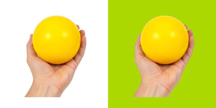 Human hand holding a smooth yellow sphere on color background