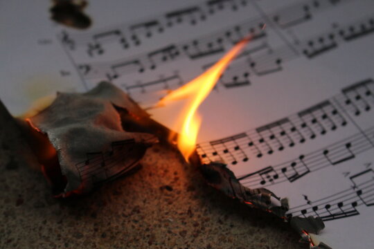 musical notes burning