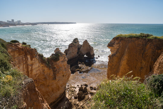 Coastal Cliffs and Sea Arches near Praia da Rocha Portimo Portugal