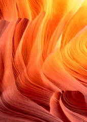 Radiant Red‑Orange Sandstone Slot Canyon Close‑Up, Flowing Layers and Textured Light © emotionpicture