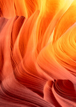 Radiant Red‑Orange Sandstone Slot Canyon Close‑Up, Flowing Layers and Textured Light