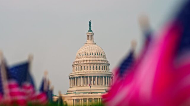 Washington DC Capitol Hill landmark. Capitol building in Washington DC. Washington national symbol patriotism. American flag waving in Washington. Vote concept. Memorial Day.