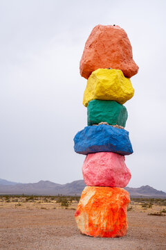 Las Vegas, Nevada - September 6, 2026: The colorful painted rocks of Seven Magic Mountains on an overcast day in the desert