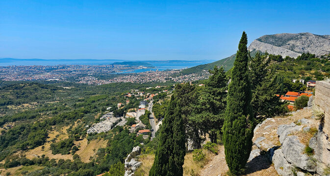 Wonderful photos of a stunning landscape in Croatia, featuring sweeping views, arid terrain, and endless expanses with water and buildings