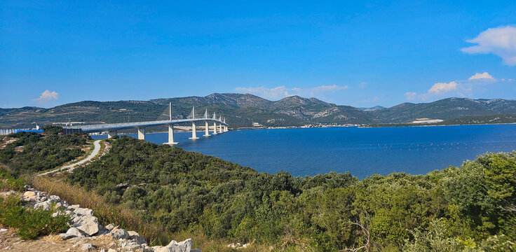Wonderful photos of a stunning landscape in Croatia, featuring sweeping views, arid terrain, and endless expanses with water and buildings
