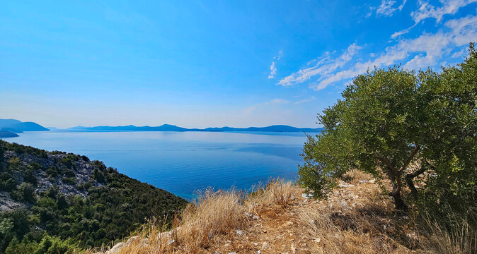 Wonderful photos of a stunning landscape in Croatia, featuring sweeping views, arid terrain, and endless expanses with water and buildings