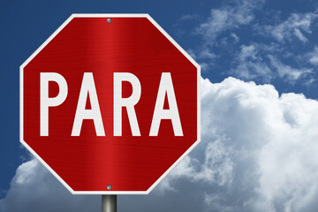 Red stop Para Spanish sign with sky © Karen Roach