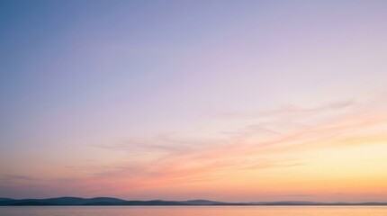 Obraz premium Serene sky gradient shifting from cool blue and lilac to warm peach and yellow, minimalist atmospheric background, soft dawn light, smooth color transitions, calm wellness and presentation aesthetic