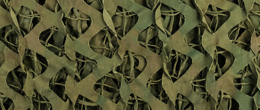 Green military camouflage netting texture. Army mesh camo net background