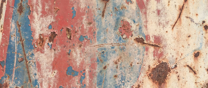 Faded and rusted vintage tin sign texture. Peeling blue and red paint on weathered metal advertising sign background