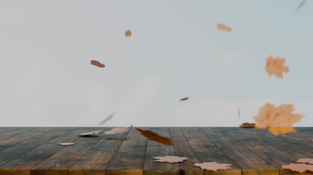 camera moves along the table. An autumn composition: autumn leaves fall onto a wooden surface and are blown away by the wind. A rustic-style animation that creates a sense of warmth.