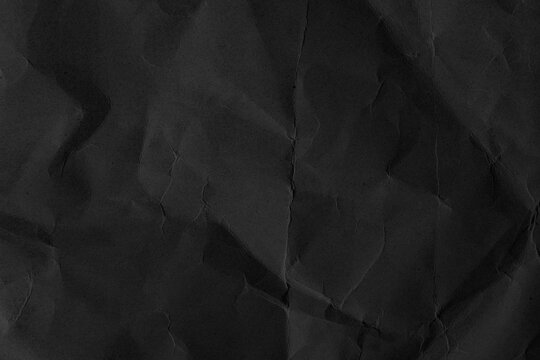  Fondo detallado con textura de papel negro arrugado. Fondo con superficie de papel oscuro arrugado; transmite minimalismo, elegancia y dise&ntilde;o t&aacute;ctil.