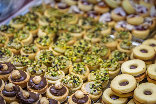 Freshly baked pistachio and hazelnut pasticcini cookies in Ventimiglia Italy