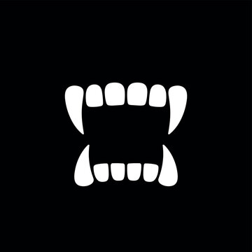 White silhouette of sharp monster teeth and fangs, open mouth isolated on a solid black background creature