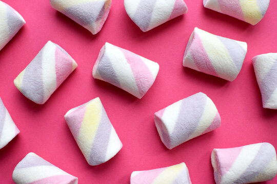Multi-colored marshmallows. Background or texture of colorful blue and pink marshmallows.