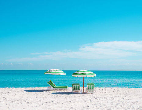 green beach umbrella and lounge chair in miami florida