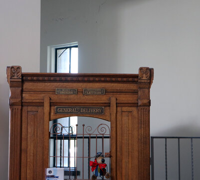 MARSHALL, MI - SEPTEMBER 14, 2026: Historic post office teller cage with brass bars