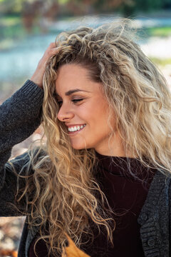 Beautiful curly hair girl closeup shot autumn portrait  