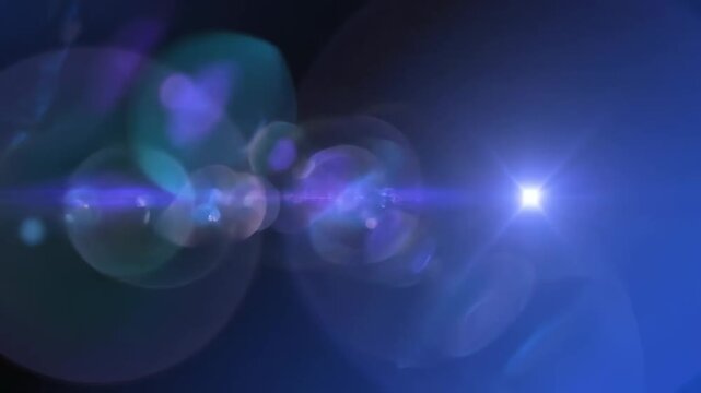 Blue lens flare transitions across a dark background with chromatic aberration lensflare transition aberration lightleak optical effect glare
