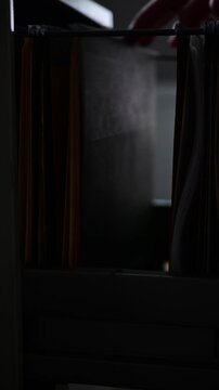 Cinematic noise vertical video Office space file folders cabinet searching for documents, textured backgrounds copy space, bokeh abstract close up