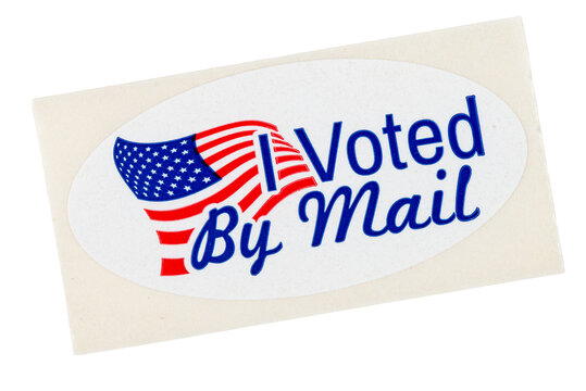 I voted by mail over an American flag sticker