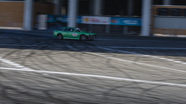 Drifting car on a racetrack in Lviv, Ukraine with speed and motion