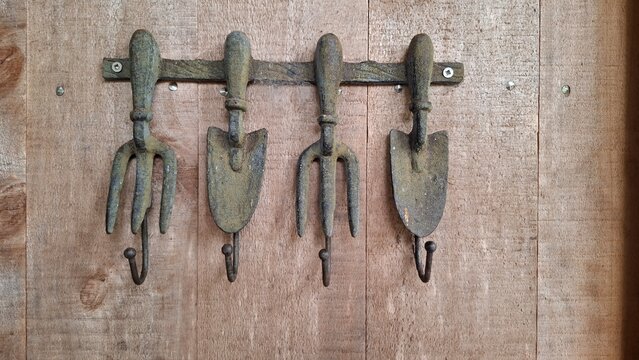 old door handle made of garden tools
