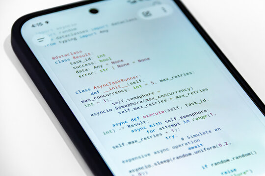 Close-Up Smartphone Displaying Python Async Programming Code on a Clean White Background