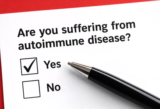 Person filling out autoimmune disease questionnaire with marked yes option