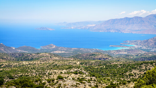 Mirabello Bay coastline and mountains high angle view, Crete, Greece