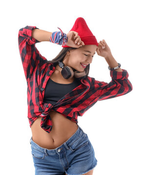 Female hip-hop dancer in hat on white background