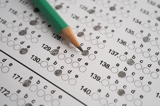 Answer sheets with pencil drawing fill to select choice, education.