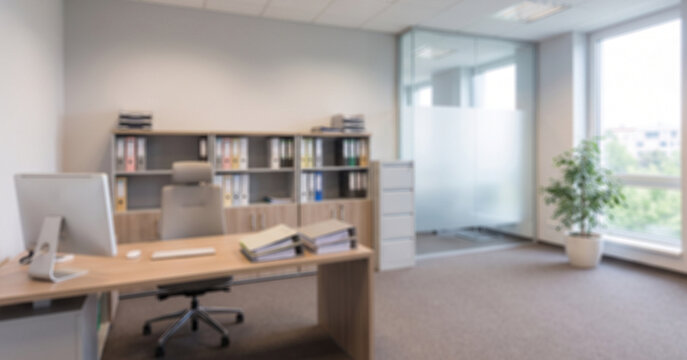Professional accounting and tax office strongly Gaussian blurred across the entire frame, creating a clean abstract financial background for accounting, audit and business services.