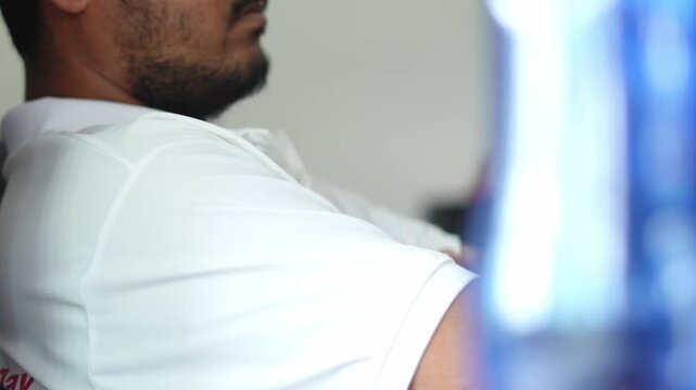 Focused man playing video games on a console