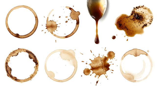 Collection of various coffee stains, rings, and splashes with a spoon isolated on white background