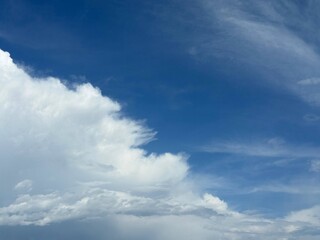 Fototapeta premium Bright blue sky with cumulonimbus clouds 