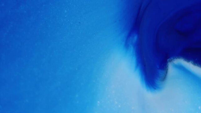 Dissolving ink. Acrylic spill. Blue violet white enamel mixing spreading abstract background. Blur color art whirl steam blend dye.